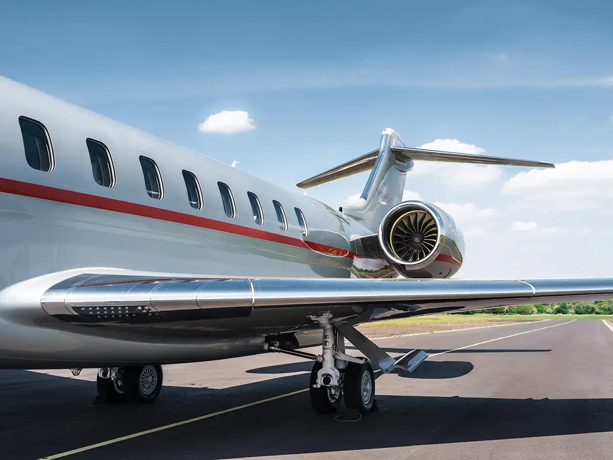 The wing and jet engine of the VistaJet Bombardier Global 8000