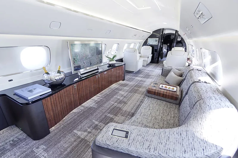 The entertainment section of the Embraer Lineage1000E cabin