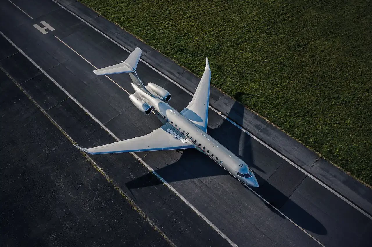 Private Jet landing at runway